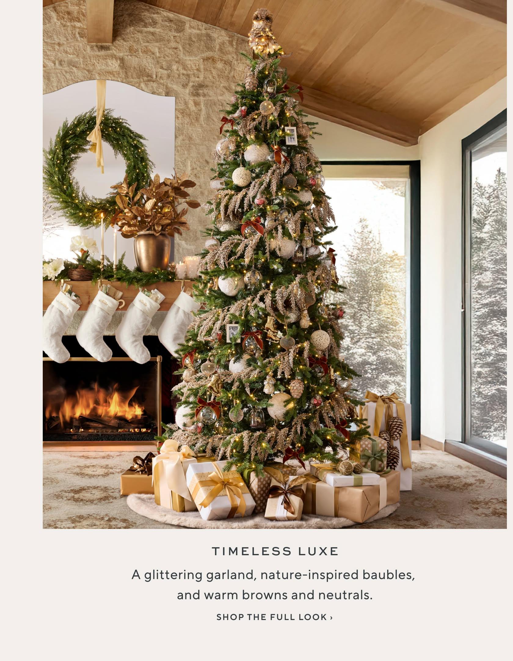 Timeless Luxe: a glittering garland, nature-inspired baubles and warm browns and neutrals. Shop the full look.